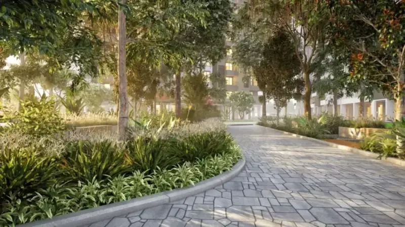 Dense landscaped gardens in Lake Echo Gardens at Suraksha Whispering Waves, Begur