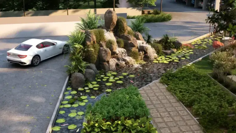 Koi pond water feature in Lake Echo Gardens at Suraksha Whispering Waves, Begur